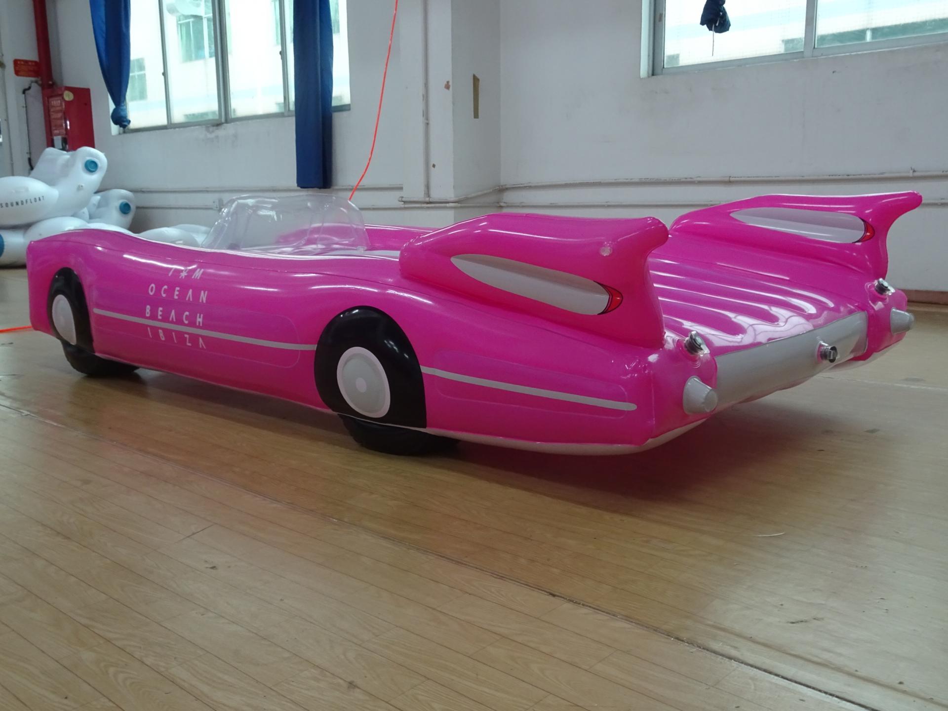 inflatable giant pink car float on beach pool 